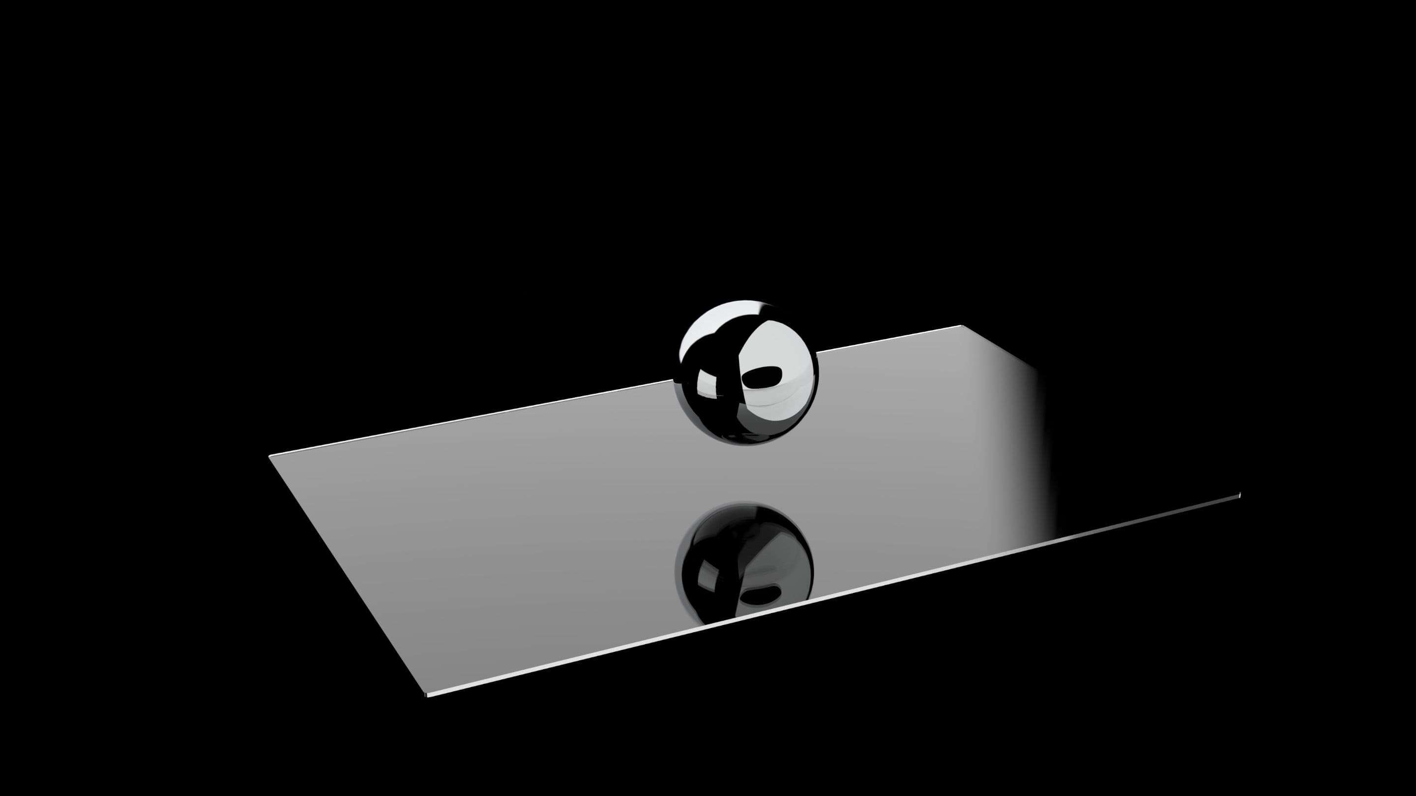 Impactinator® Glas - Impactinator® glas 'n silwer bal op 'n reghoekige oppervlak