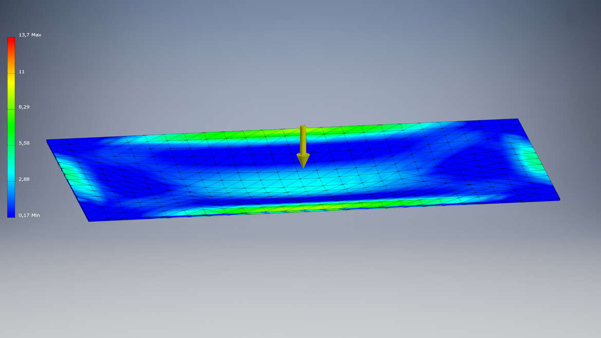 Impactinator® Glass - Development and services for special glass a blue and green rectangular object with a yellow arrow pointing at it